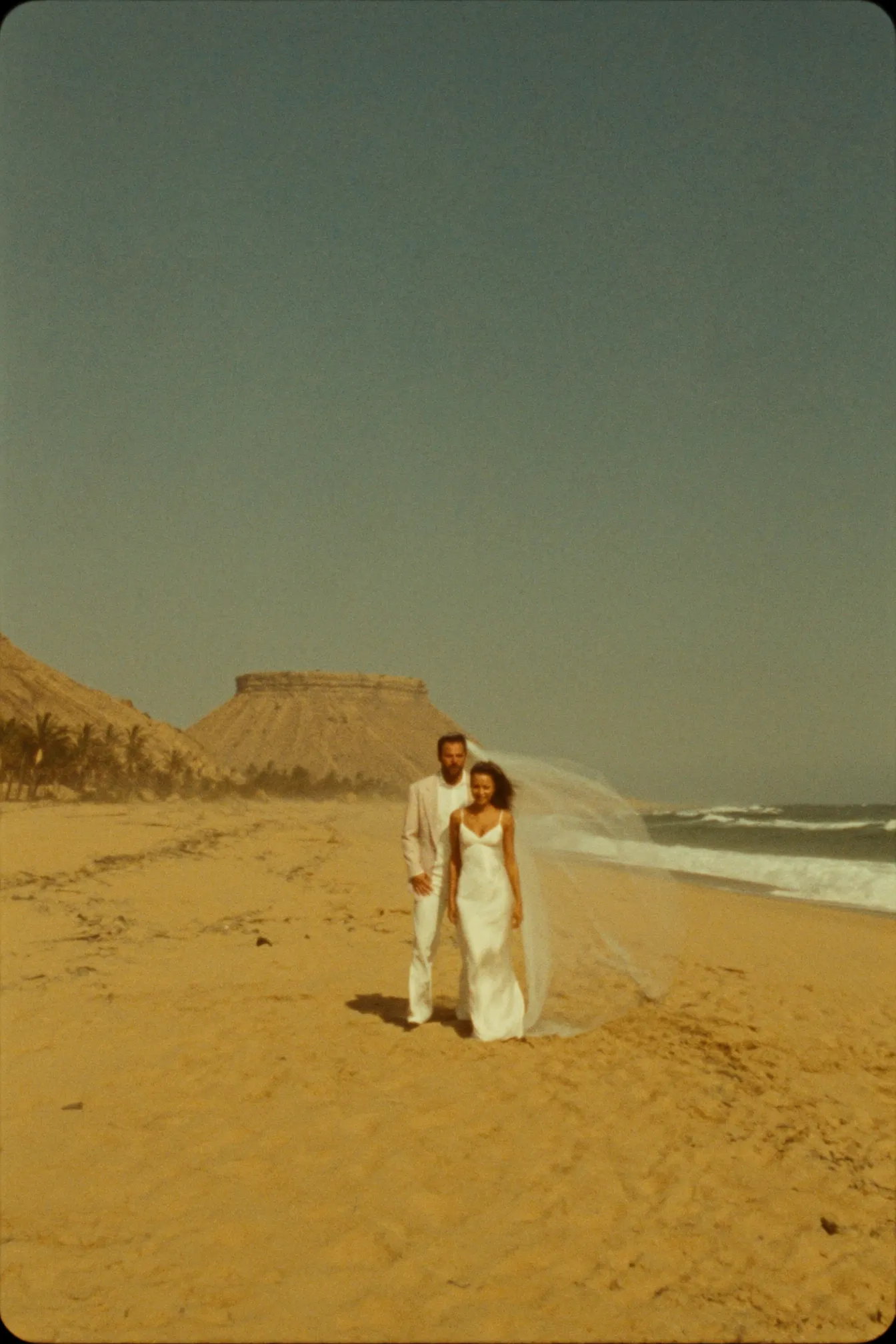A couple eloping on a wild Baja Pacific beach near Todos Santos