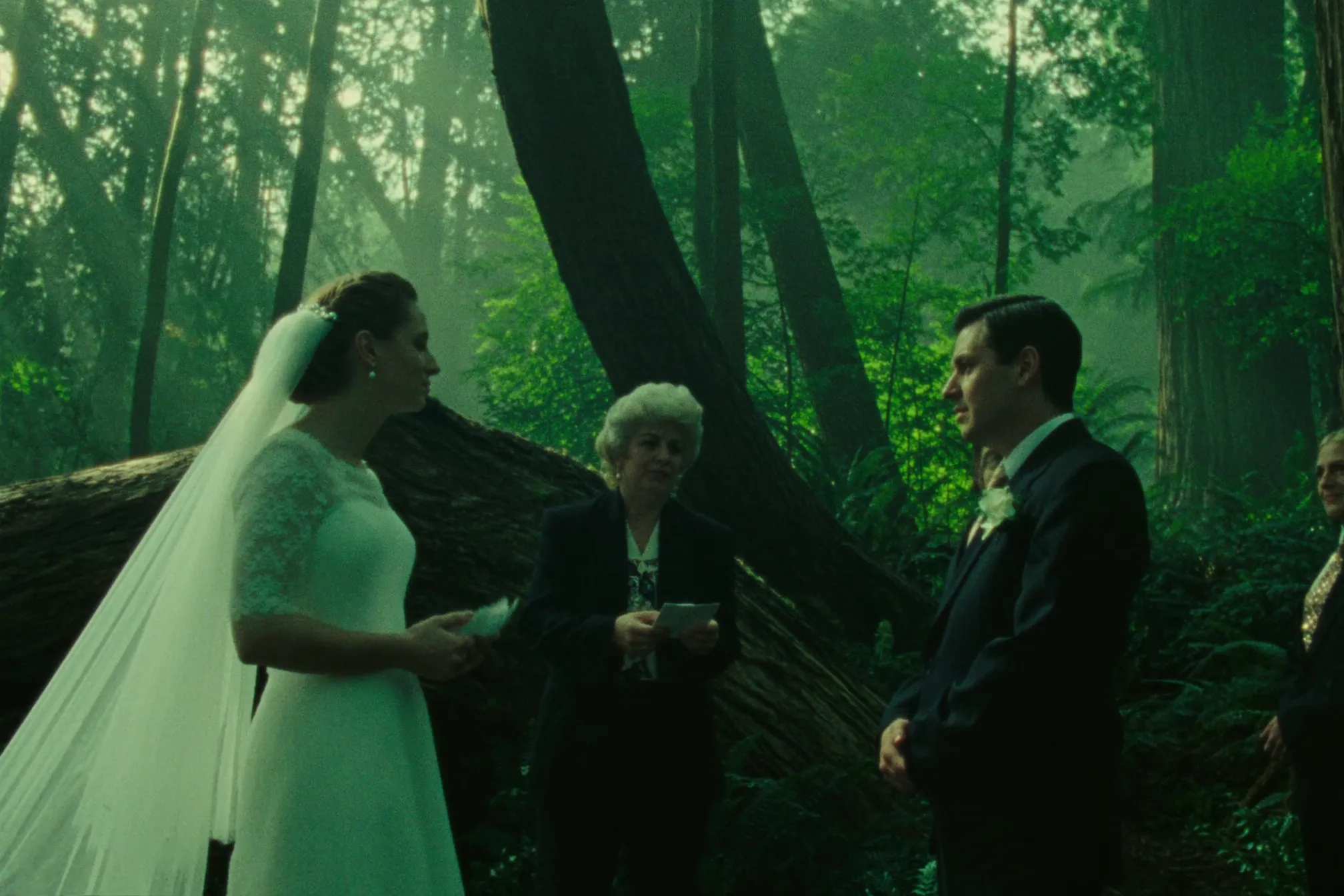 A couple exchanging vows in the Stanley Park old-growth rainforest